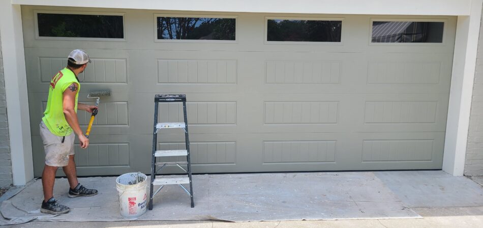 JMA Painters professional painter, painting a garage door